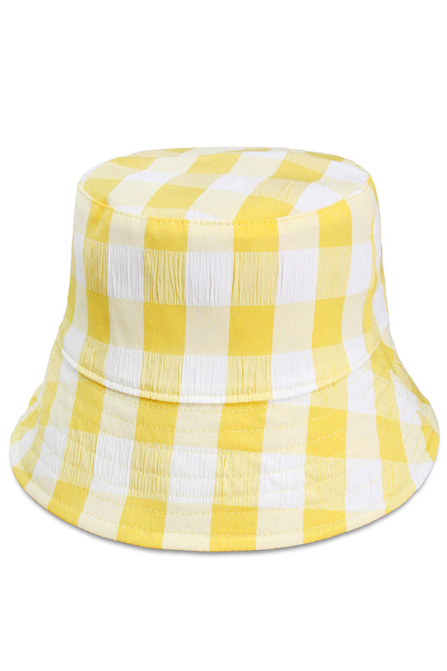 Yellow PLAID REVERSIBLE WIRED BRIM BUCKET HAT features a versatile reversible design with a classic plaid pattern. The wired brim provides customizable structure, allowing you to shape it to your preference while maintaining its form throughout wear. Constructed with quality materials for durability and style, this hat offers practical sun protection with sophisticated aesthetic appeal. 