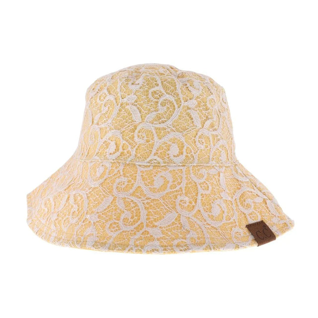 Honey-Mustard- Reversible Lace C.C Bucket Hat combines sophisticated lace detailing with practical design, offering two distinct styles in one accessory. Crafted for durability and comfort, this hat features a breathable fabric that ensures a comfortable fit while providing sun protection. Its reversible nature allows seamless transition between a delicate lace look and a classic bucket hat style, making it a versatile addition to any wardrobe. Perfect for those who appreciate both elegance and functionalit