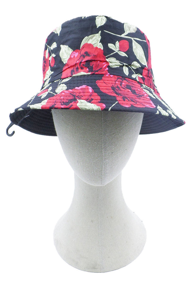 Black Rose Print Bucket Hat combines fashion and functionality with its distinctive floral pattern. Crafted from durable materials, it offers reliable sun protection while elevating your casual wardrobe. The versatile silhouette complements various outfits, making it an essential accessory for outdoor activities or everyday wear. Its comfortable fit and practical design make it suitable for all-day use.
