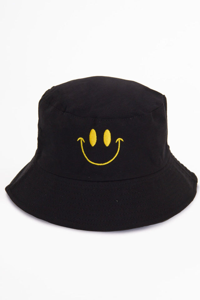 Black SMILE PRINT REVERSIBLE BUCKET HAT features a playful smile print design, offering two distinct looks in one versatile accessory. Constructed with quality materials for durability, it provides effective sun protection while adding a stylish, cheerful element to casual outfits. Perfect for outdoor activities or everyday wear. 