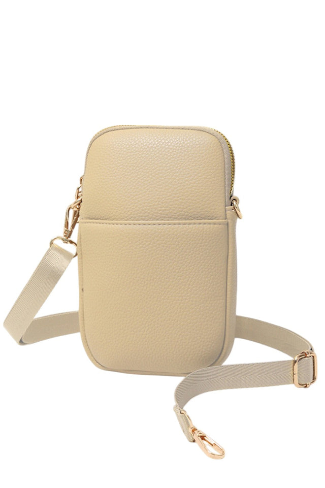 Solid PU Cell Phone Strap Bag offers a sleek and durable solution for carrying your phone hands-free. Crafted from high-quality PU leather, it combines style with practicality, providing secure storage and easy access. The adjustable strap ensures a comfortable fit, making it ideal for daily use or travel. Its minimalist design complements any outfit while protecting your device from scratches and minor impacts. Perfect for those seeking convenience without compromising on elegance. 