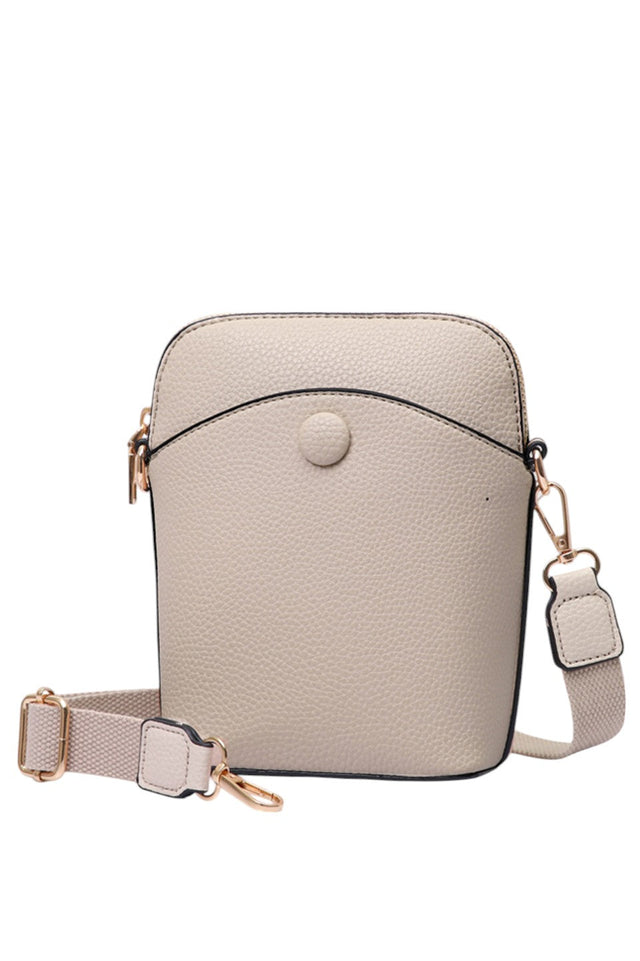 Solid PU Mini Crossbody Bag combines durability with a sleek design, crafted from high-quality polyurethane for a lightweight yet sturdy feel. Its compact size offers convenient hands-free carrying, ideal for daily essentials. The adjustable strap ensures a customized fit, making it perfect for on-the-go use without compromising style or functionality. 