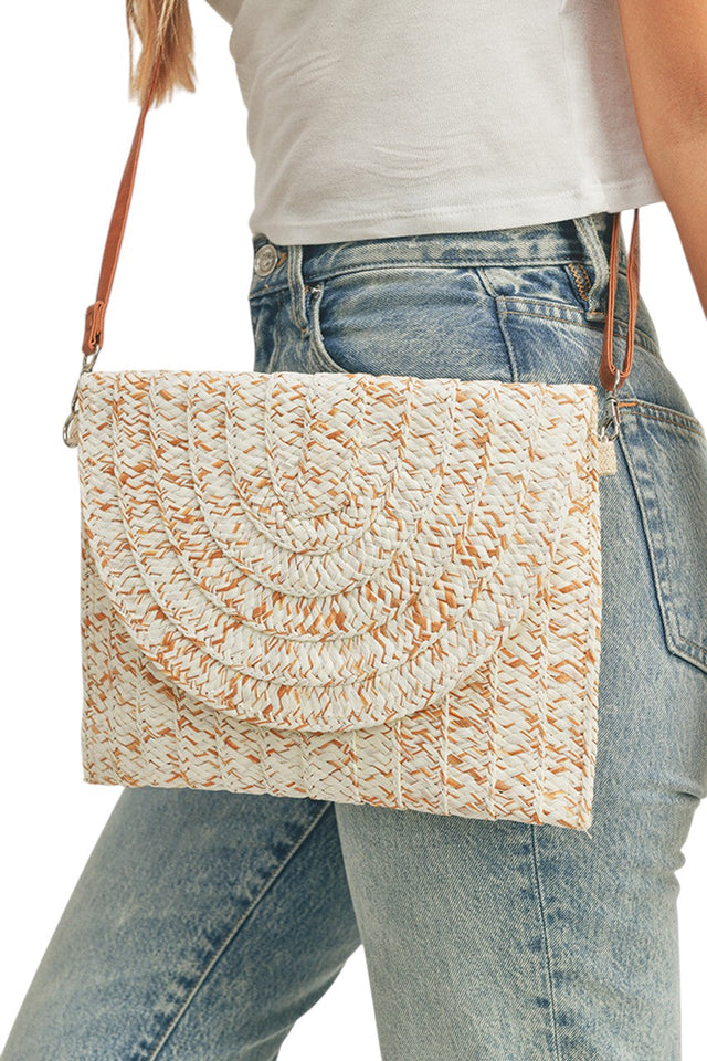 Straw Envelope Crossbody Clutch Bag combines refined craftsmanship with practical design. Made from durable straw material, it offers a lightweight yet sturdy structure. Its envelope silhouette provides organized storage, while the adjustable crossbody strap ensures comfortable, hands-free wear. Ideal for casual outings or elegant events, this clutch delivers a sophisticated, natural look that complements a variety of styles.