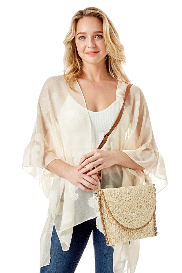 Textured Envelope Clutch Crossbody Bag combines sophisticated design with practical functionality. Crafted with a distinctive textured finish, this bag offers a sleek envelope silhouette that enhances any outfit. Its crossbody strap provides hands-free convenience, making it ideal for both day and evening use. Compact yet spacious enough to hold essentials, it’s a refined accessory for those who appreciate style and versatility. 