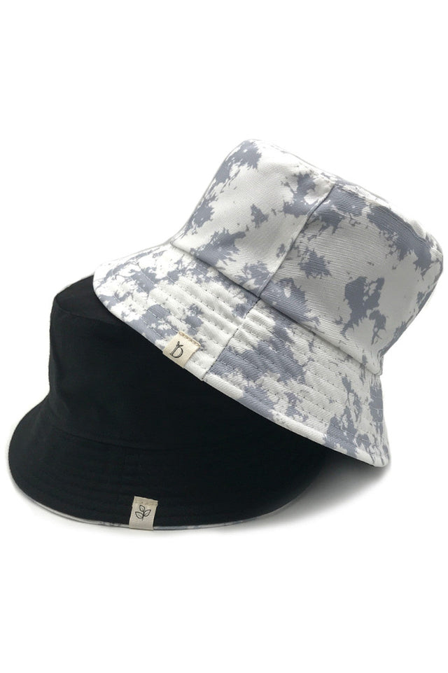 Gray Tie Dye Bucket Hat features a professionally executed color pattern with exceptional color retention. The structured design maintains its shape while providing optimal sun protection with a 2.5-inch brim. Constructed from high-density cotton fabric, it offers breathability and comfort during extended wear, making it an essential accessory for fashion-forward outdoor enthusiasts. 