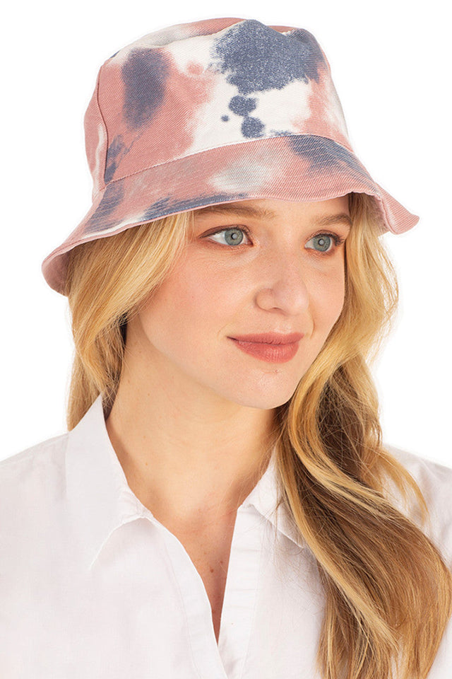 Pink TIE DYE REVERSIBLE BUCKET HAT features vibrant tie-dye patterns that deliver two distinct looks in one versatile accessory. Constructed with premium materials for durability, it provides effective sun protection while making a bold fashion statement. Perfect for festivals, beach outings, or adding a touch of artistic flair to everyday ensembles. 
