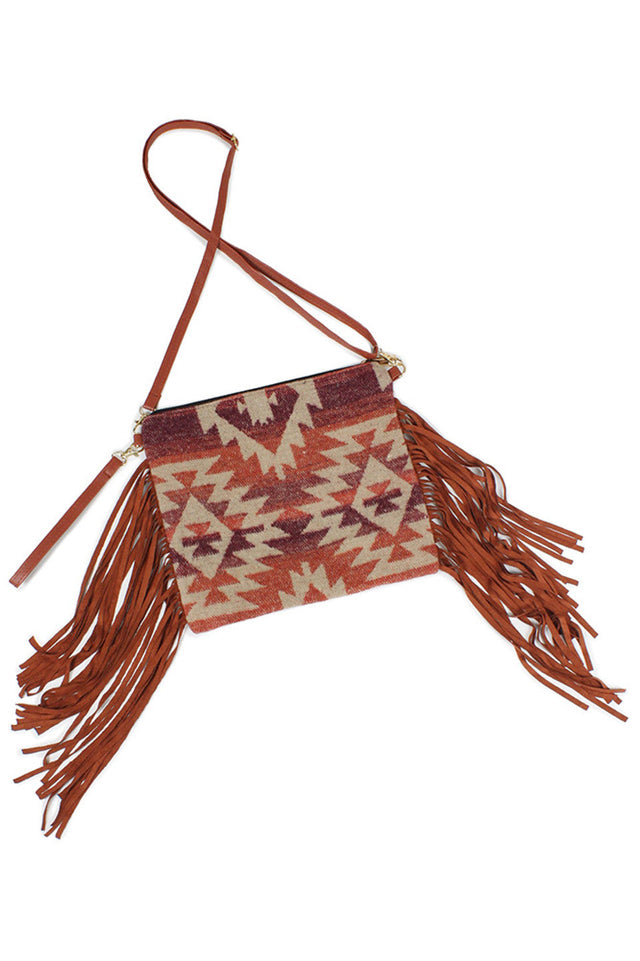 Western Tassel Crossbody Bag combines rustic charm with practical design, featuring a durable construction ideal for everyday use. Its adjustable strap ensures comfortable wear, while the decorative tassel adds a distinctive western flair. Perfect for hands-free convenience, this bag offers ample space for essentials, making it a versatile accessory for both casual outings and stylish events. 