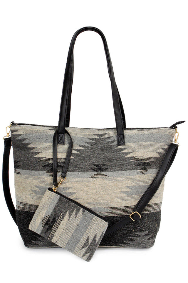 Western Weekend Tote Bag with Pouch combines spacious design with practical organization, making it ideal for short trips or daily use. Crafted for durability and style, this tote features a roomy main compartment alongside a detachable pouch to keep essentials easily accessible. Its sturdy construction ensures reliable performance, while the classic western-inspired aesthetic adds a timeless touch to your travel gear. Perfect for those seeking both function and fashion in a versatile carryall. 