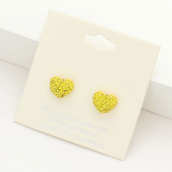 Yellow Crystal Pave Heart Stud Earrings add elegance to any outfit. The sparkling pave design is crafted precisely, and the heart shape symbolizes love and affection, making them the perfect accessory for any special occasion.