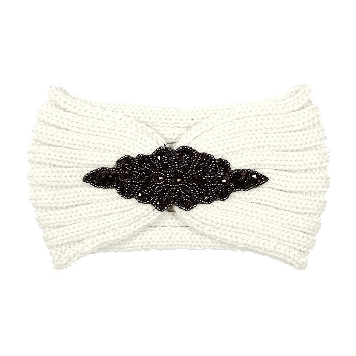 Embellished Beaded Flower Applique Cable Knit Headband Earmuff Ear Warmer can be worn centered or to the side, will shield your ears from cold winter weather. Earband is soft, comfy & warm, adds a trendy style to your look while protecting you of the cold winds, keeps you toasty. Pink, Black, Ivory, Gray; 100% Acrylic 