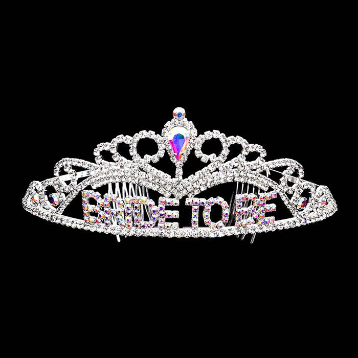 AB Silver Bride To Be Rhinestone Princess Tiara. The wedding tiara is a classic royal tiara made from gorgeous rhinestone is the epitome of elegance and bridal luxury and grace. Unique Hair Jewelry is suitable for any special occasions such as wedding, engagement,prom,evening,etc.It's the most exquisite gift for the bride to be.It as the perfect complement will make your whole wedding dress look come to life.