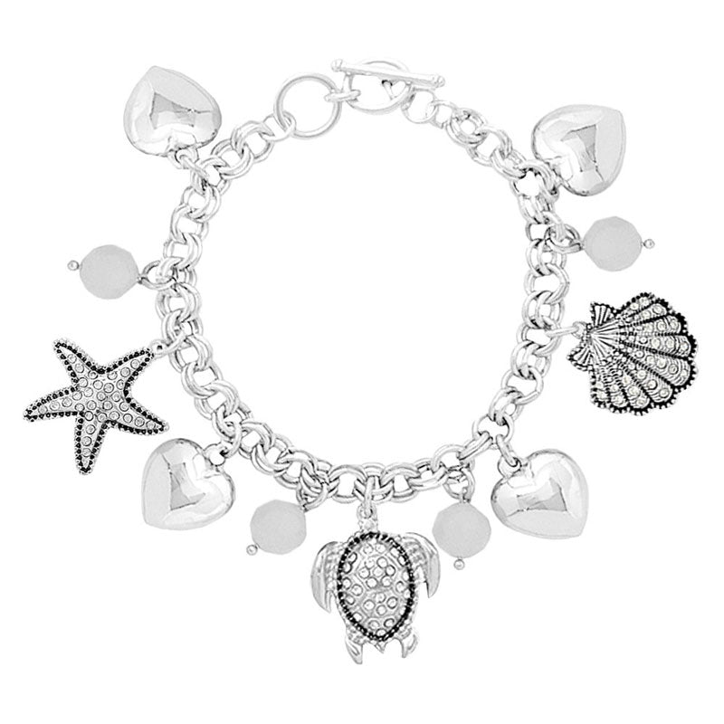 Antique Silver Rhinestone Embellished Starfish Turtle Shell Toggle Bracelet. This sea-themed bracelet features a parade of marine creatures for a fun, beachy vibe. With a polished finish and lifelike details. A timeless and traditional Holiday, Anniversary gift, Birthday gift, Valentine's Day gift for a woman or girl of any age.