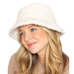 Beige Faux Fur Sherpa Bucket Hat, this bucket hat is a comfy & cozy hat and is snug on the head and stays on well to make your day perfect. It will work well to keep you comfortable and the sun out of the eyes and also the back of the neck. Wear it to lend a modern liveliness above an outfit on trans-seasonal days in the city to give yourself a unique look. Stay trendy and beautiful.
