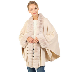 Beige Faux Fur Trimmed Solid Long Shawl Poncho Cape, ensure your upper body stays perfectly warm when the temperatures drop, timelessly beautiful, gently nestles around the collar and feels exceptionally comfortable to wear. This fur themed faux fur poncho cape is a perfect accessory, luxurious, trendy, super soft chic capelet, keeps you warm and toasty. Perfect winter gift for your loved ones.