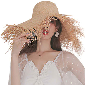 Beige Frayed Straw Sun Hat, whether you’re basking under the summer sun at the beach, lounging by the pool, or kicking back with friends at the lake, a great hat can keep you cool and comfortable even when the sun is high in the sky. Large, comfortable, and perfect for keeping the sun off of your face, neck, and shoulders, ideal for travellers who are on vacation or just spending some time in the great outdoors.