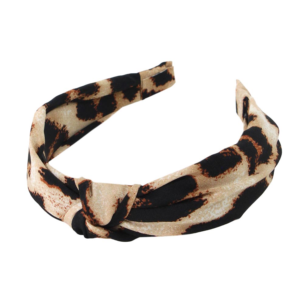 Beige Leopard Patterned Burnout Knot Headband, this headband with a beautiful Leopard pattern creates a natural look while perfectly matching your color with the easy-to-use knot headband. Push back your hair with this exquisite knotted headband, and spice up any plain outfit! Adds a super neat and trendy knot to any boring style. 