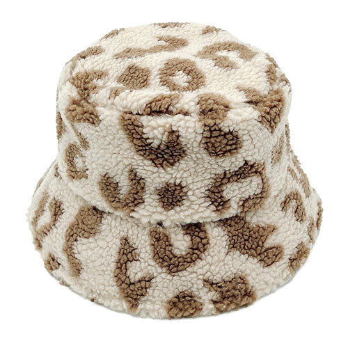 Beige One Size Leopard Patterned Faux Fur Bucket Hats, stay warm and cozy, protect yourself from the cold, this most recognizable look with remarkable bold, soft & chic bucket hat, features a rounded design with a short brim. The hat is foldable, great for daytime. Perfect Gift for cold weather!