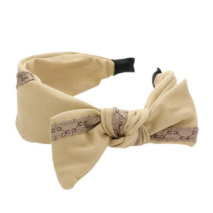Beige Pattern Detailed Bow Headband, create a beautiful look while perfectly matching your color with the easy-to-use pattern detailed bow headband. Add a super neat and trendy knot to any boring style. Perfect for everyday wear, special occasions, outdoor festivals, and more. Awesome gift idea for your loved one or yourself