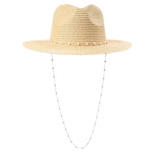 Beige Pearl Embellished Panama Straw Sun Hat, The Chain Strap Straw Panama Hat is one of the most exquisite hats to date. Decorated with pearls, it brings summer sophistication right to your look. It is the trendy hat of the summer!