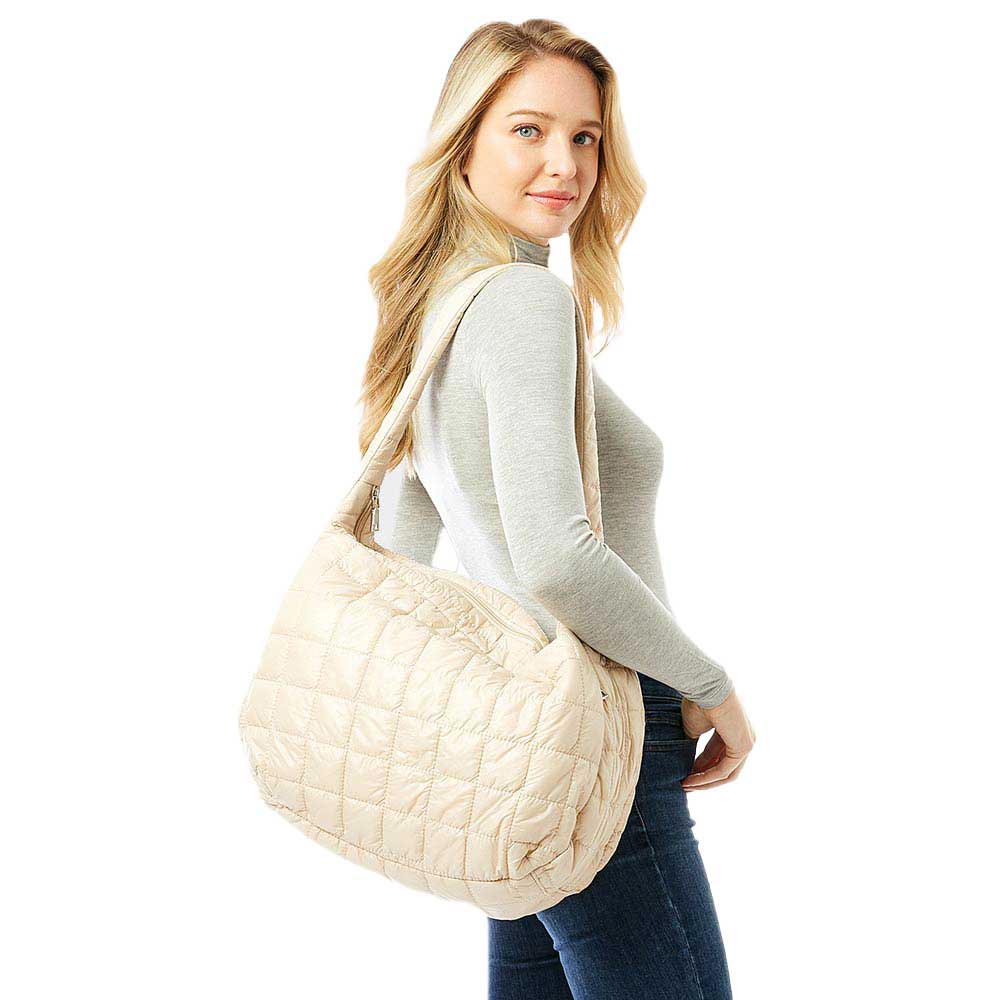 Beige Quilted Puffer Hobo Bag, The quilted puffer hobo bag has a stylish, elegant, classic fashionable design! Has plenty of room to carry all your handy items with ease. Trendy and beautiful bag amps up your outlook while carrying. Great for different activities including quick getaways, holidays, Shopping, beach, or even going outdoors! This Hobo bag features a top zipper closure for security that makes your life easier and trendier. Its catchy and awesome appurtenance drags everyone's attraction to you. 