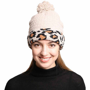 Beige Solid Color Linked Leopard Accented Pom Pom Beanie, accessorize the fun way with this leopard-designed beanie to receive compliments. The autumnal touch you need to finish your outfit and ensure maximum comfort and durability with perfect style. It keeps you warm, toasty, and totally unique everywhere. Awesome winter gift accessory for Birthday, Christmas, holidays, anniversaries, and Valentine’s Day to your friends, family, and loved ones. Enjoy the season!