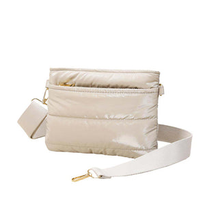 Beige Glossy Solid Puffer Crossbody Bag, Complete the look of any outfit on all occasions with this Shiny Puffer Crossbody Bag. This Puffer bag offers enough room for your essentials. With a One Front Zipper Pocket, One Back Zipper Pocket, and a Zipper closure at the top, this bag will be your new go-to! The zipper closure design ensures the safety of your property. The widened shoulder straps increase comfort and reduce the pressure on the shoulder.