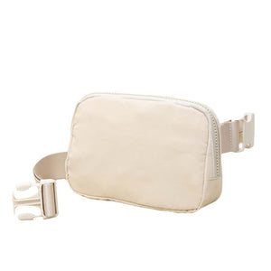 Beige Solid Puffer Sling Bag, show your trendy side with this awesome solid puffer sling bag. It's great for carrying small and handy things. Keep your keys handy & ready for opening doors as soon as you arrive. The adjustable lightweight features room to carry what you need for those longer walks or trips. These Puffer Sling Bag packs for women could keep all your documents, Phone, Travel, Money, Cards, keys, etc., in one compact place, comfortable within arm's reach. Stay comfortable and smart.