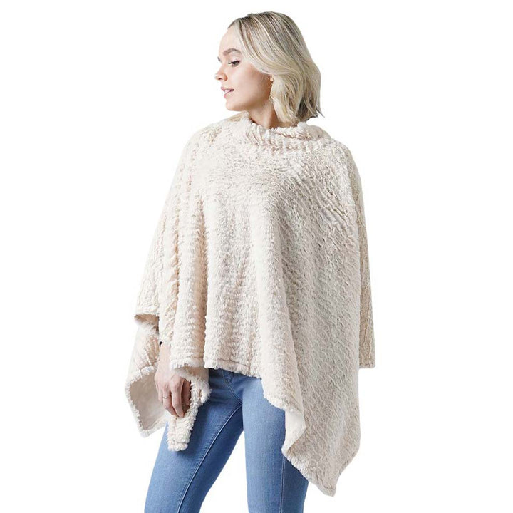 Beige Supersoft Loose Turtleneck Ribbed Poncho, is the perfect accessory for the comfort, luxury and trendiness this winter. You can throw it on over so many pieces elevating any casual outfit! Smooth and cool color variety and eye-catching look will enrich your luxe and glamour in a greater extent. Perfect Gift for Wife, Mom, Birthday, Holiday, Christmas, Anniversary, Fun Night Out. Stay awesome with this beautiful poncho!