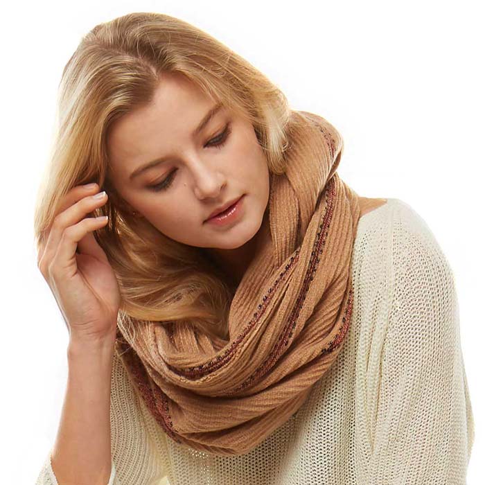 Beige Stripe Textured Boucle Infinity Scarf, makes your beauty more enriched with a classy look. Great to wear daily in the cold winter to protect you against the chill. It amps up the glamour with a plush material that feels amazing snuggled up against your cheeks. It gives a lot of options to dress up your attire. It goes well with any outfit from jeans and a tee to work trousers and a sweater. Feel warm, comfortable and smart at any place, any time.