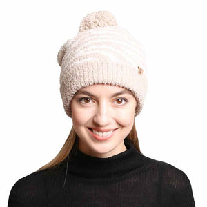 Beige Zebra Lined Pom Pom Beanie. These awesome trendy women’s Beanie With Faux Fur Pom are Warm, durable and comfortable. This will be your go-to beanie this fall and winter season. These zebra themed beannie has classic style that allows you to enhance your outfit, no matter your wardrobe. Accessorize the fun way with this faux fur pom pom hat, Awesome winter gift accessory! Perfect Gift Birthday, Christmas, Stocking Stuffer, Secret Santa, Holiday, Anniversary, Valentine's Day, Loved One.