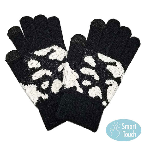 Ivory Black Acrylic One Size Cow Patterned Knit Smart Gloves. Before running out the door into the cool air, you’ll want to reach for these toasty gloves to keep your hands incredibly warm. Accessorize the fun way with these gloves, it's the autumnal touch you need to finish your outfit in style. Awesome winter gift accessory!