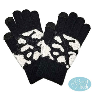 Black Acrylic One Size Cow Patterned Knit Smart Gloves. Before running out the door into the cool air, you’ll want to reach for these toasty gloves to keep your hands incredibly warm. Accessorize the fun way with these gloves, it's the autumnal touch you need to finish your outfit in style. Awesome winter gift accessory!