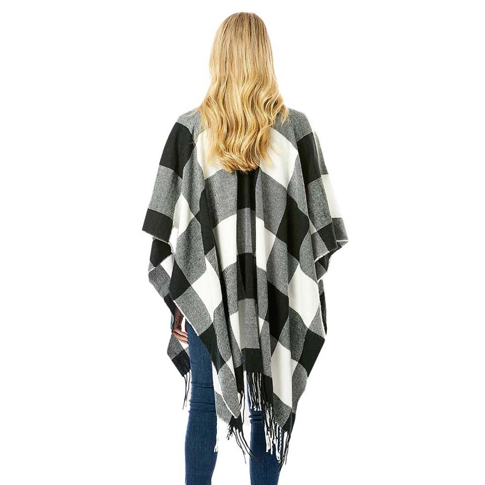 Black Buffalo Plaid Ruana, is a beautiful addition to your attire that will amp up your beauty with perfect warmth on winter and cold days. This nice buffalo plaid ruana is on trend and keeps you warm and toasty. You can throw it on over so many pieces elevating any casual outfit! Lightly ribbed soft-touch in beautiful buffalo plaid that is perfect for layering. Happy winter!