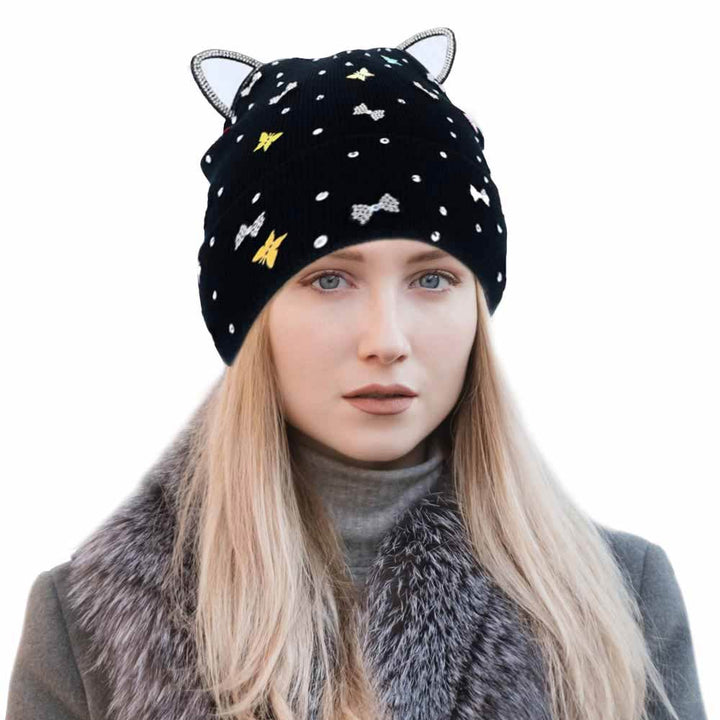 Black Cat Ear Ribbon Stone Embellished Beanie Hat, cat ear ribbon toasty beanie to keep you incredibly warm. It will make you stand out from the crowd. Accessorize the fun way with this stone embellished hat, it's the autumnal touch you need to finish your outfit in style. Perfect to wear at winter parties, prom, graduation, wedding, etc. Awesome winter gift accessory!