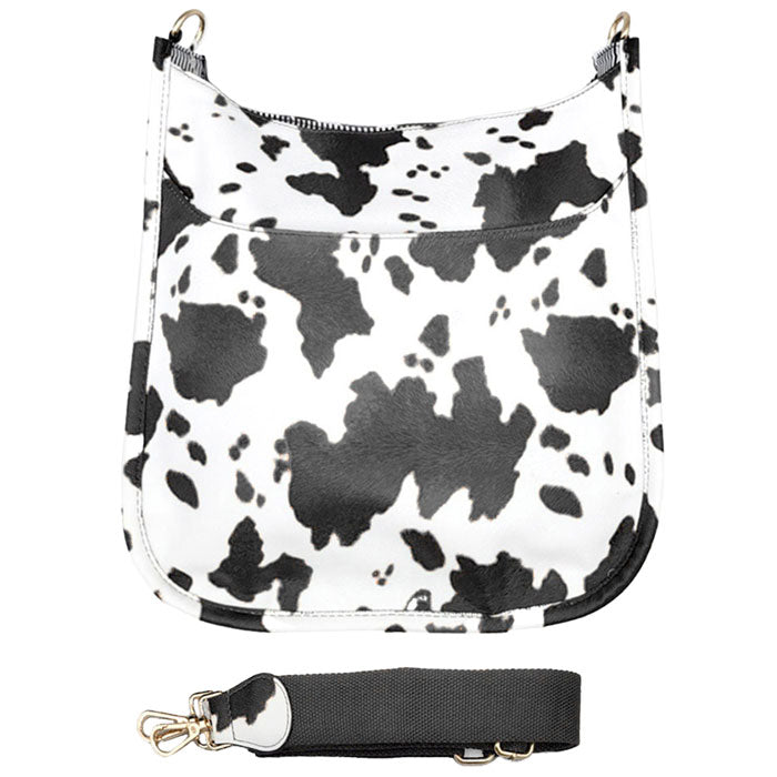 Black Cattle Patterned Faux Leather Crossbody Bag. These animal themed crossbody bag is uniquely detailed, featuring a bright giving this bag that sophisticated look. This gorgeous bag is going to be your absolute favorite new purchase! It features with adjustable and detachable handle strap, upper zipper closure. Ideal for keeping your money, bank cards, lipstick, and other small essentials in one place.