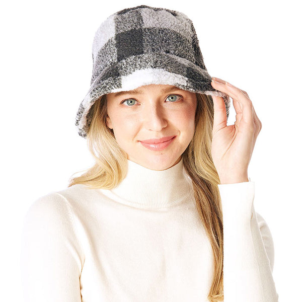 Black Check Patterned Faux Fur Bucket Hat, this Faux Fur check patterned bucket hat is nicely designed and a great addition to your attire. Have fun and look stylish anywhere outdoors. Great for covering up when you are having a bad hair day. Perfect for protecting you from the wind, snow, beach, pool, camping, or any outdoor activities in cold weather. Amps up your outlook with confidence with this trendy bucket hat. It's the autumnal touch you need to finish your outfit in style.