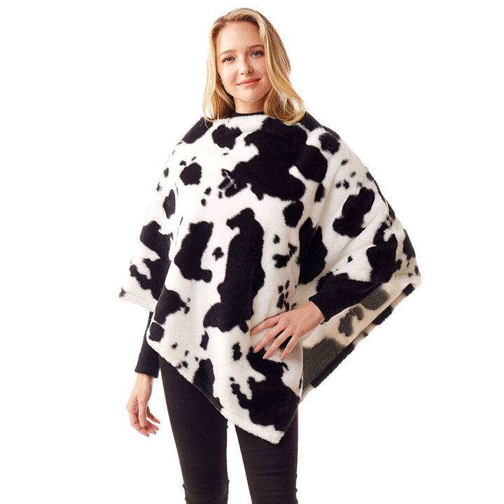 Black Cow Patterned Soft Faux Fur Poncho, the perfect accessory, luxurious, trendy, super soft chic capelet, keeps you warm and toasty. You can throw it on over so many pieces elevating any casual outfit! Perfect Gift for Wife, Mom, Birthday, Holiday, Christmas, Anniversary, Fun Night Out