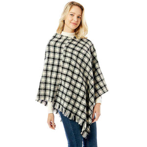 Black Diamond Pattern Knitted Poncho, make perfect stle with this beautifully knitted poncho. You can draw attention to the contrast of different outfits. Diamond patterned with a knitted design gives a unique decorative and awesome modern look that makes your day beautiful. Match well with jeans and T-shirts or a vest. A stylish eye-catcher and will become one of your favorite accessories soon.