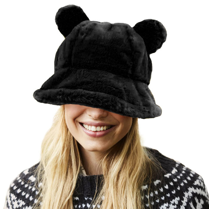 Black Faux Fur Bear Ear Bucket Hat, Show your excellent choice with this chic Faux Fur bear Bucket Hat. This animal themed bucket hat is nicely designed and a great addition to your attire. Have fun and look Stylish anywhere outdoors. Great for covering up when you are having a bad hair day. Perfect for protecting you from the wind, snow, beach, pool, camping, or any outdoor activities in cold weather. Amps up your outlook with confidence with this trendy bucket hat. 