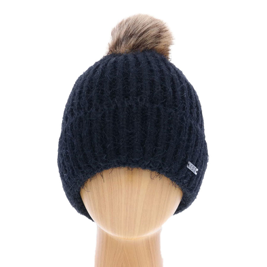 Black Faux Fur Pom Pom Cuffed Single Layered Beanie Hat, Before running out the door into the cool air, you’ll want to reach for this toasty beanie to keep you incredibly warm. Whenever you wear this beanie hat, you'll look like the ultimate fashionista. Accessorize the fun way with this single layered pom pom hat which gives you the autumnal touch that you need to finish your outfit in style. Perfect Gift for Birthdays, Christmas, holidays, anniversaries, Valentine’s Day, etc. 