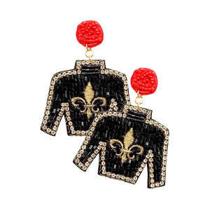 Black Felt Back Seed Beaded Fleur de Lis Top Dangle Earrings, are beautifully crafted earrings that dangle on your earlobes with a perfect glow to make you stand out and show your unique and beautiful look everywhere. Put on a pop of color to complete your ensemble stylishly with these Fleur de Lis-themed earrings. Highlight your appearance and grasp everyone's eye at any place. Enhance your attire with these beautiful artisanal earrings to show off your fun trendsetting style.