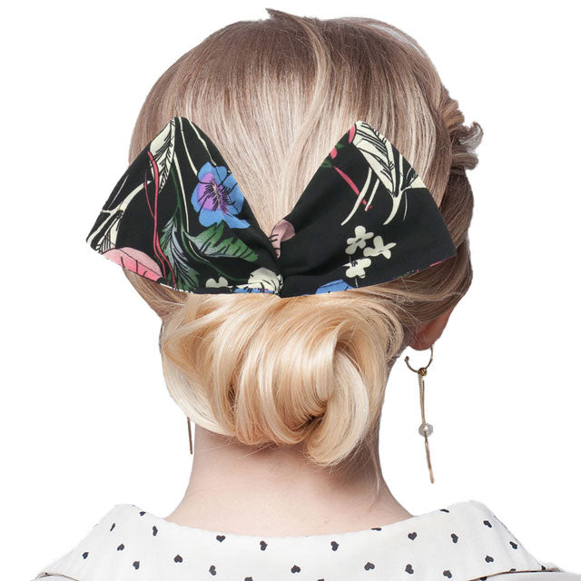 Black Flexible Flower Leaf Printed Deft Bun Maker Hair Band. Deft Bun Maker Hair Band making you feel extra glamorous. Push back your hair with this pretty Bun Maker Hair Band, add a pop of color to any plain outfit! Be ready to receive compliments. Be the ultimate trendsetter wearing this chic headband with all your stylish outfits!