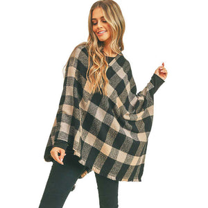 Black Multi Color Checker Poncho, ensure your upper body stays perfectly toasty when the temperatures drop, timelessly beautiful, gently nestles around the neck and feels exceptionally comfortable to wear this multi color checker poncho. A fashionable eye catcher, will quickly become one of your favorite accessories, warm and goes with all your winter outfits.