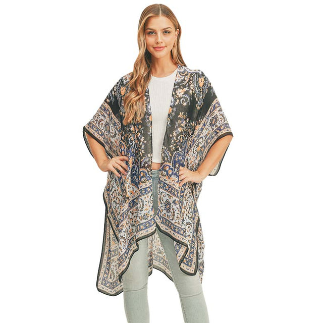 Black Patterned Cover Up Kimono Poncho, Absolutely fab for this summer & spring season to amp up your attire & make you comfortable in dressing up. These kimonos feature a beautiful pattern that is easy to pair with so many tops. 