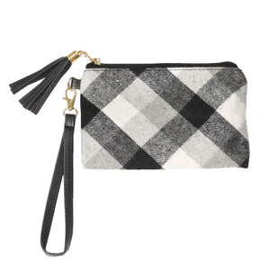 Black Plaid Check Wristlet Pouch Bag, gives you the most comfortable dealing with a trendy look. The color variety, lightweight, and size make the pouch perfect to grab according to your own choice. It includes an easy-carrying hand strap. It's a perfect gift for any occasion and a stylish accessory for any place.