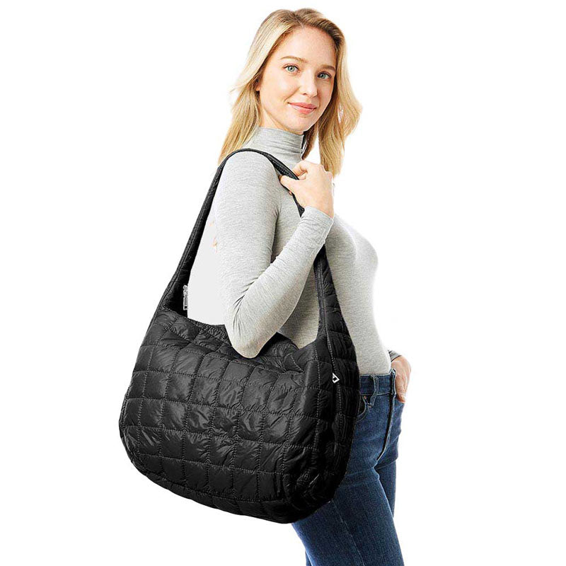 Black Quilted Puffer Hobo Bag, The quilted puffer hobo bag has a stylish, elegant, classic fashionable design! Has plenty of room to carry all your handy items with ease. Trendy and beautiful bag amps up your outlook while carrying. Great for different activities including quick getaways, holidays, Shopping, beach, or even going outdoors! This Hobo bag features a top zipper closure for security that makes your life easier and trendier. Its catchy and awesome appurtenance drags everyone's attraction to you. 