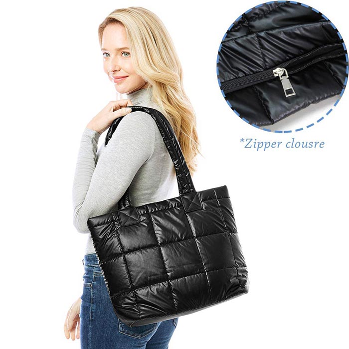 Black Quilted Shiny Puffer Tote Bag, has plenty of room to carry all your handy items with ease. This handbag features a top zipper closure for security that makes your life easier and trendier. Its catchy and awesome appurtenance drags everyone's attraction to you. Perfect gift ideas for a Birthday, Holiday, Christmas, Anniversary, Valentine's Day, etc. Great for different activities including quick getaways, long weekends, picnics, beach, or even going to the gym! 