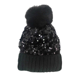 Black Sequin Pom Pom Knit Beanie Hat, Knitted Beanie is designed with sequins and pom pom, chic and lovely, to make you more charming and attractive in autumn and winter. The beanie hat for women is made from high-quality material and sequins, which is chunky and warm, making it ideal for winter warmth, while be stylish in the crowds at the same time.