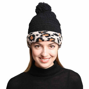 Black Solid Color Linked Leopard Accented Pom Pom Beanie, accessorize the fun way with this leopard-designed beanie to receive compliments. The autumnal touch you need to finish your outfit and ensure maximum comfort and durability with perfect style. It keeps you warm, toasty, and totally unique everywhere. Awesome winter gift accessory for Birthday, Christmas, holidays, anniversaries, and Valentine’s Day to your friends, family, and loved ones. Enjoy the season!