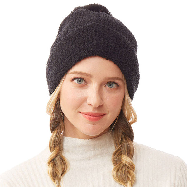 Black Solid Pom Pom Soft Fluffy Beanie Hat. Before running out the door into the cool air, you’ll want to reach for these toasty beanie hats to keep your hands incredibly warm. Accessorize the fun way with these beanie hats, it's the autumnal touch you need to finish your outfit in style. Awesome winter gift accessory!